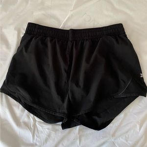 Black athletic shorts. Size large.